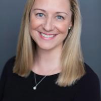 Headshot of blond female assistant professor, Sarah Collins.